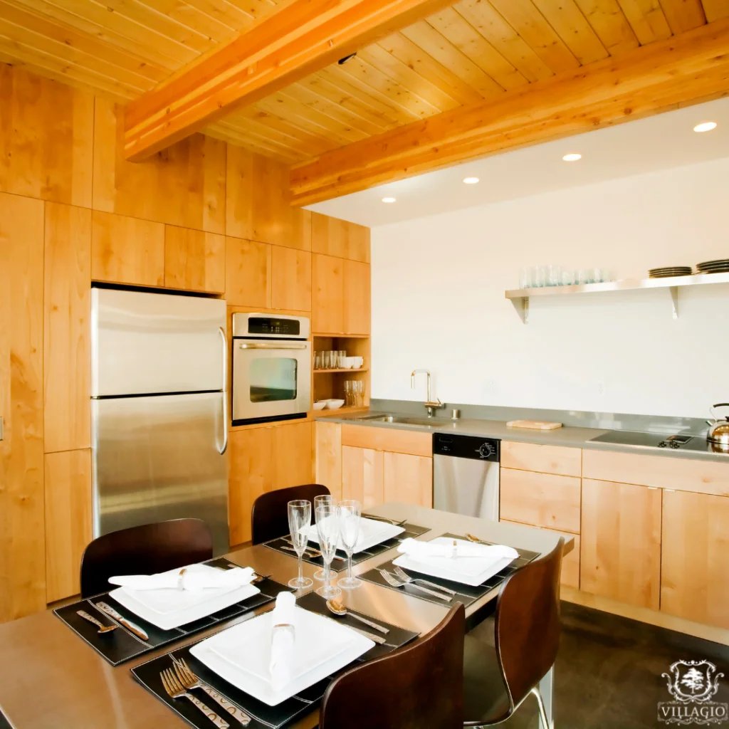 odern kitchen with hardwood cabinetry and dining area